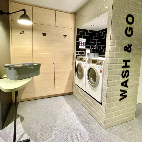 Zeitwohnhaus Waschküche mit Waschmaschine